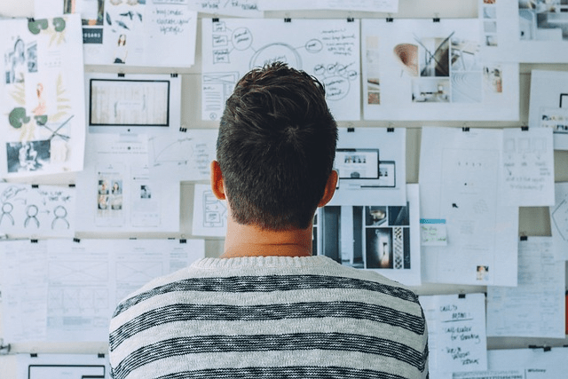 The Risk Manageement Steps include reviewing of risks - a man stars at risks on board